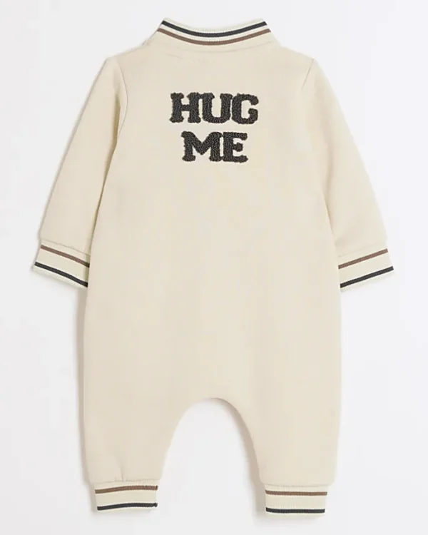 Baby cream embroidered sleepsuit