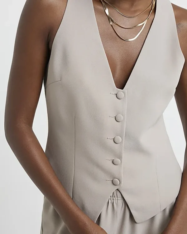 Beige button front waistcoat