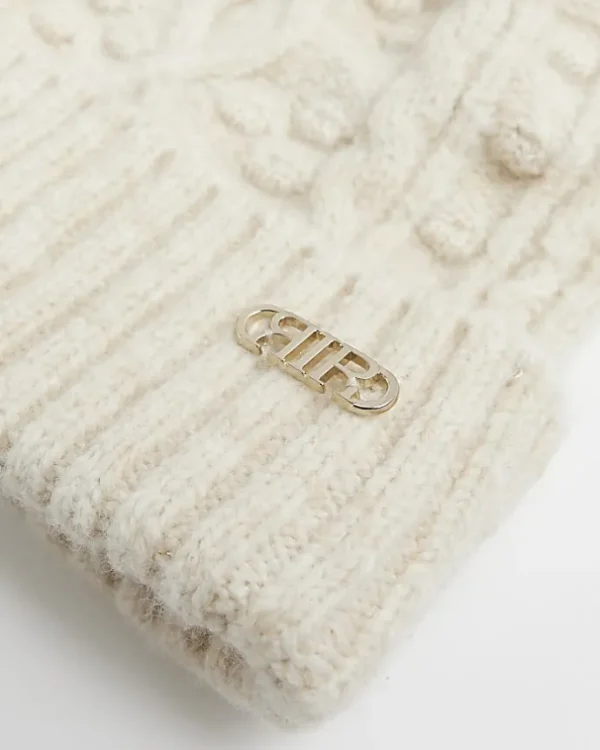 Beige cable knit beanie hat