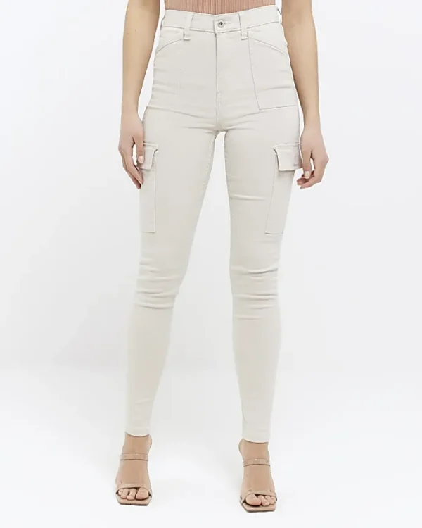 Beige high waisted skinny cargo jeans