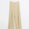 Beige high waisted wide leg trousers