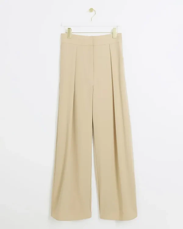 Beige high waisted wide leg trousers