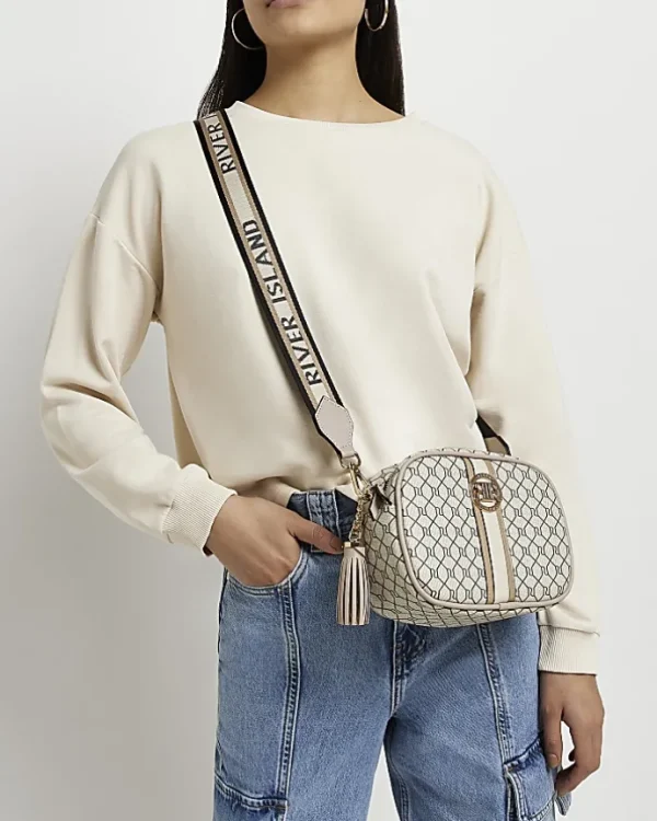 Beige RI monogram print cross body bag