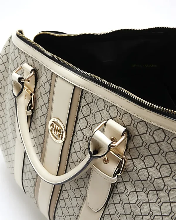 Beige RI monogram travel bag