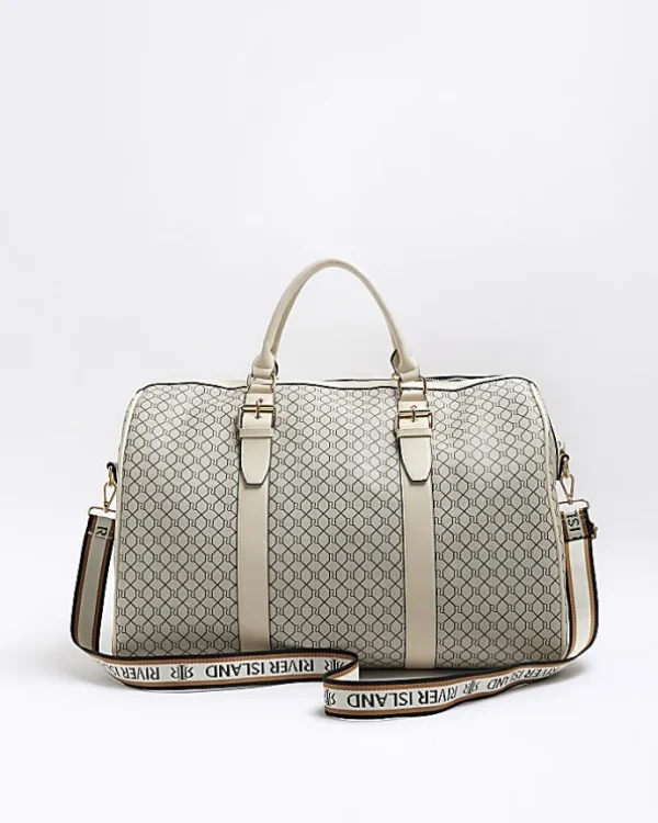 Beige RI monogram travel bag