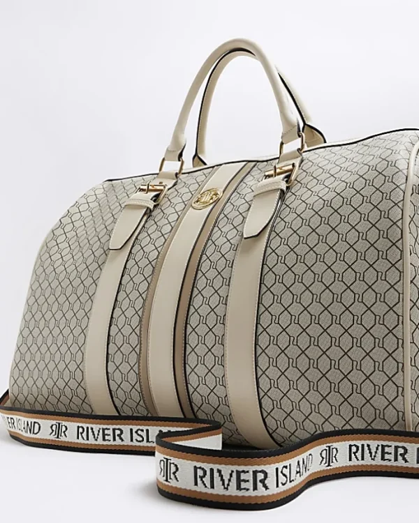 Beige RI monogram travel bag