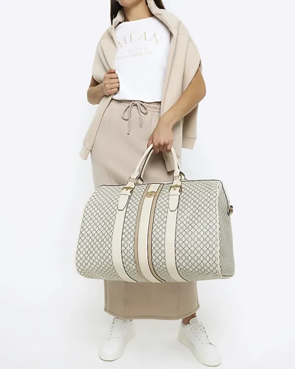 Beige RI monogram travel bag