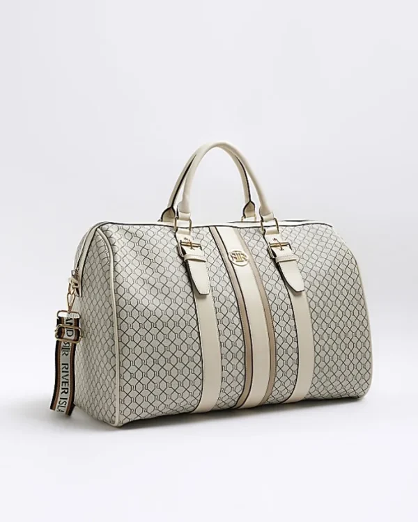 Beige RI monogram travel bag