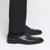 Black brogue derby shoes