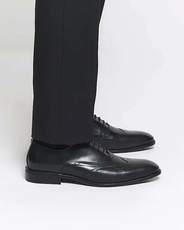 Black brogue derby shoes