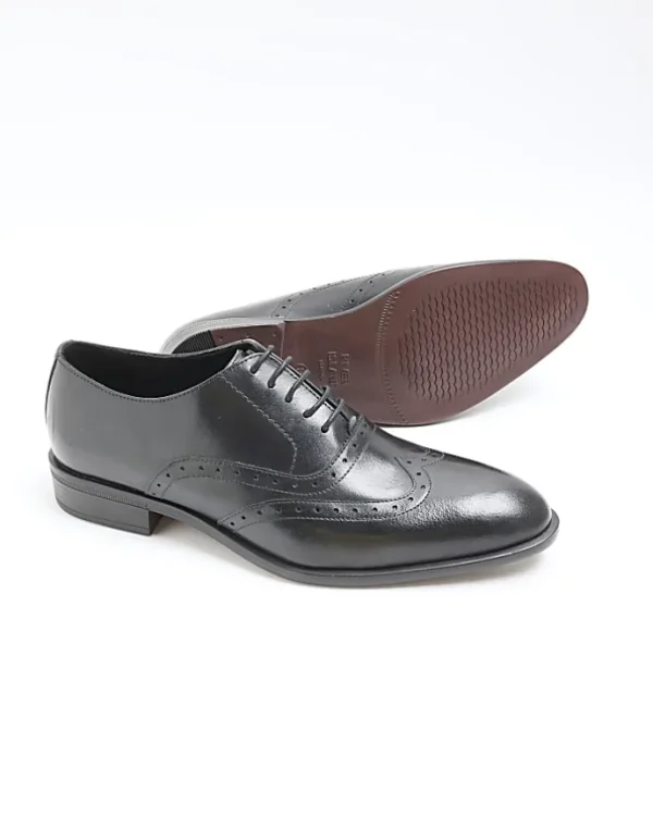 Black brogue derby shoes