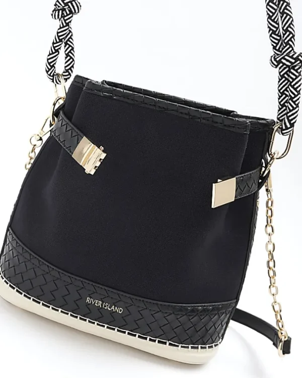 Black canvas bucket shoulder bag