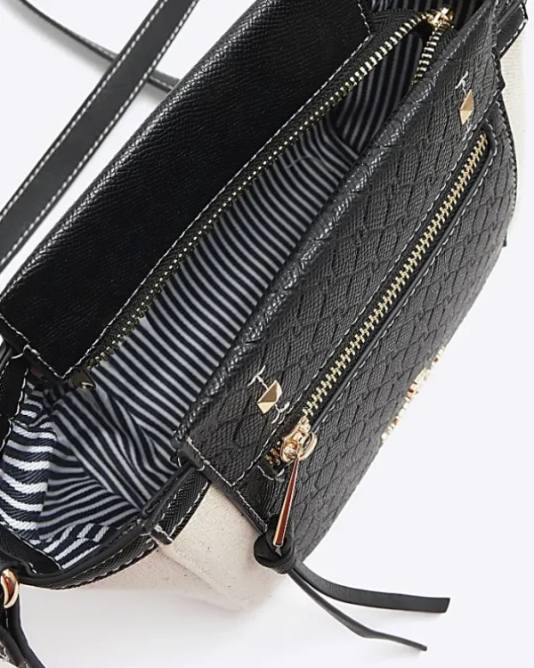 Black canvas embossed RI cross body bag