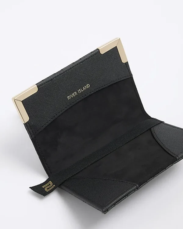 Black embossed passport holder