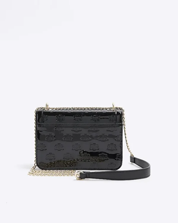 Black embossed RI lock shoulder bag