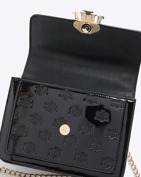 Black embossed RI lock shoulder bag