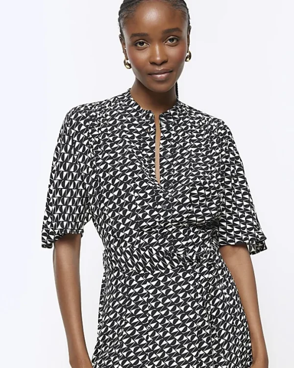 Black geometric belted midi shirt dress