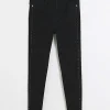 Black high waisted stud skinny jeans