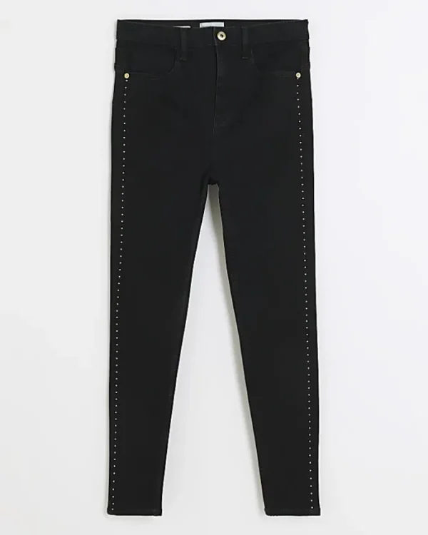 Black high waisted stud skinny jeans