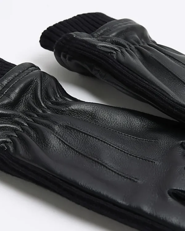 Black leather gloves