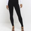 Black mid rise jeggings