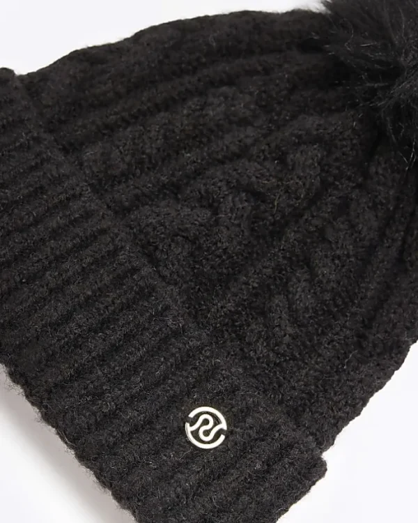 Black pom pom cable knit beanie hat