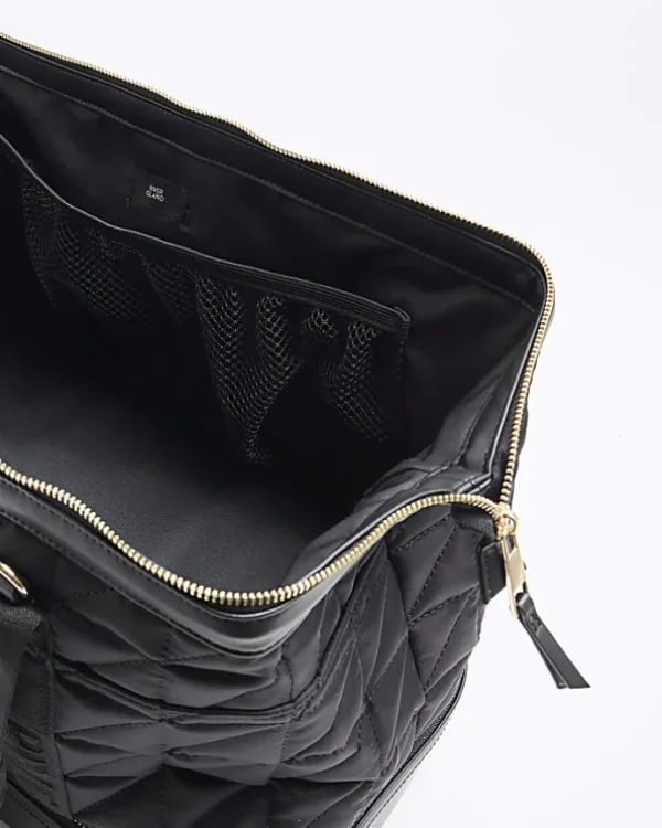 Black quilted travel bag