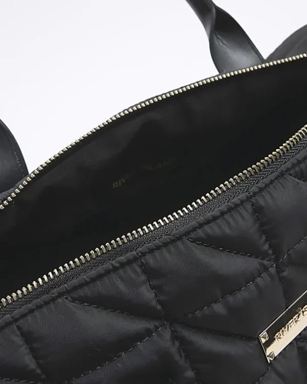 Black quilted travel bag