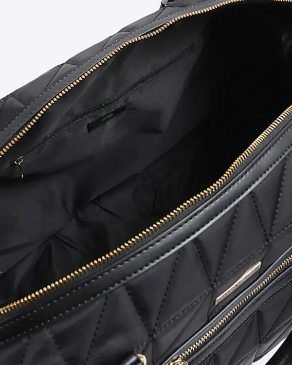 Black quilted zip travel bag