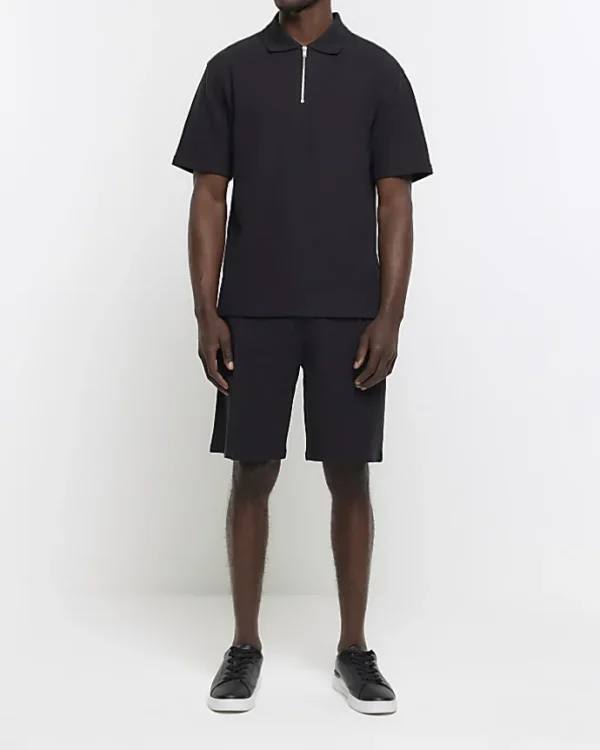 Black regular fit textured half zip polo