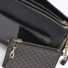 Black RI monogram pouch cross body bag