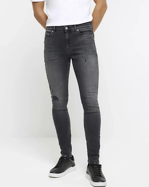 Black spray on super skinny fit ripped jeans