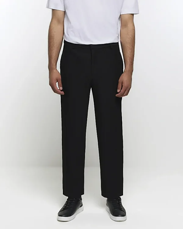 Black tapered fit plisse smart trousers