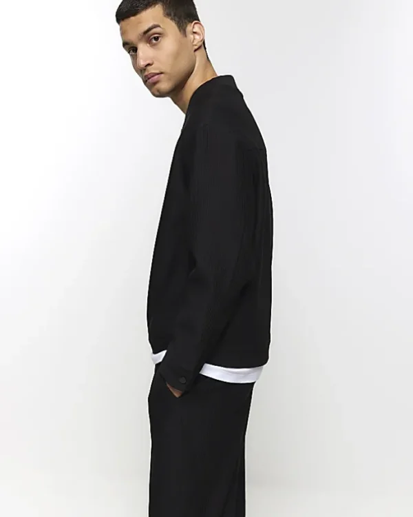 Black tapered fit plisse smart trousers