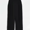 Black wide leg pleated trousers