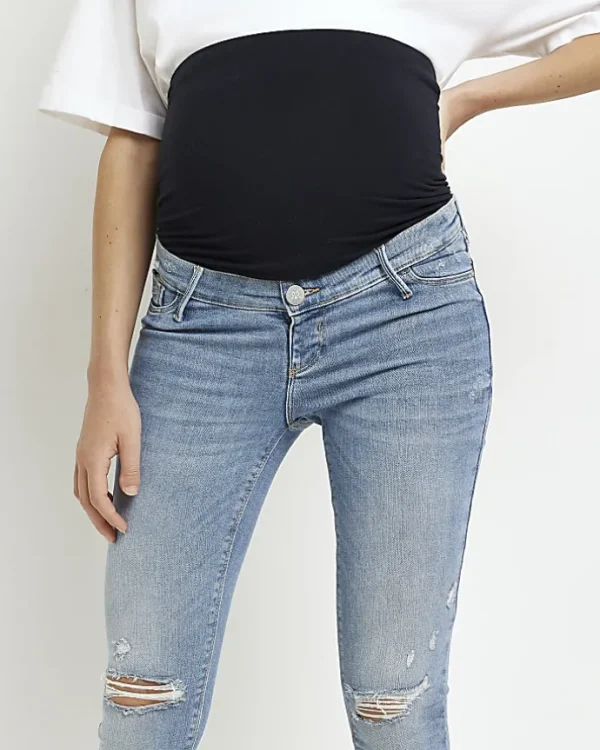 Blue mid rise maternity ripped skinny jeans