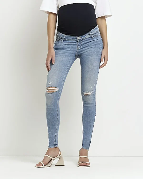 Blue mid rise maternity ripped skinny jeans