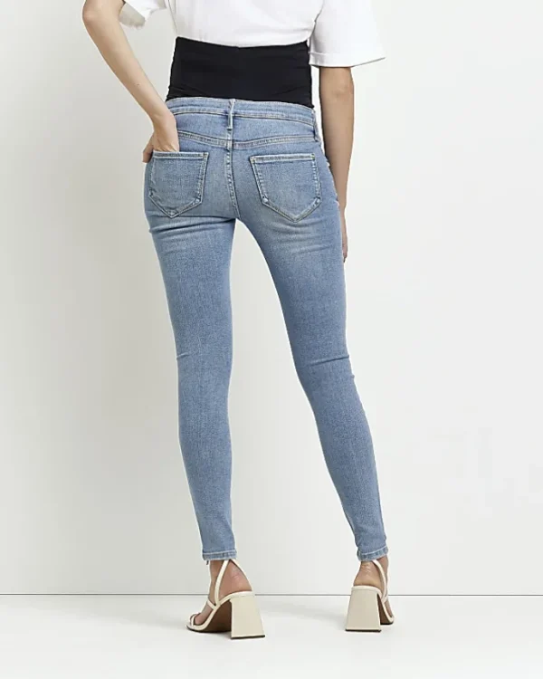 Blue mid rise maternity ripped skinny jeans