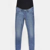 Blue mid rise maternity skinny jeans