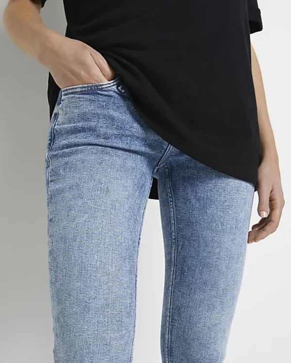 Blue mid rise maternity skinny jeans