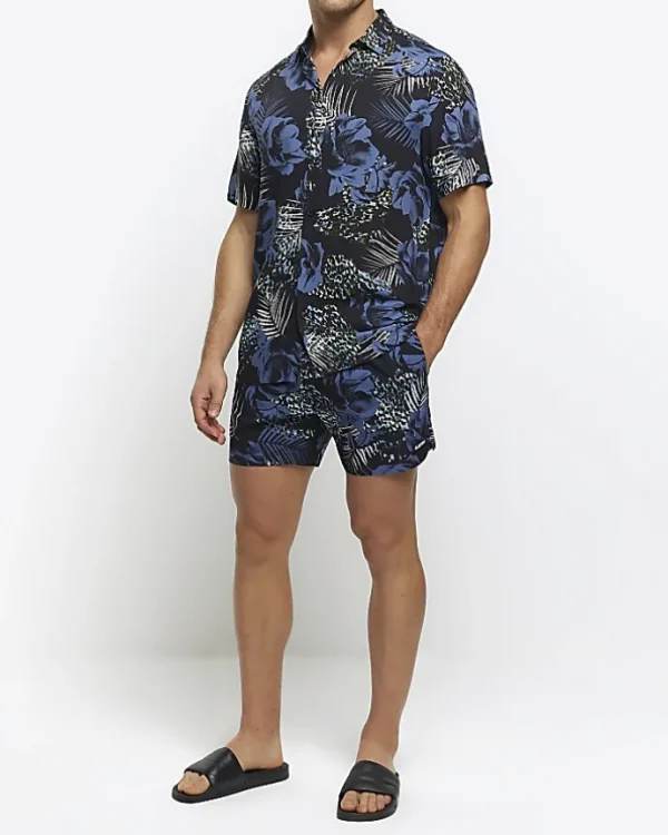 Blue regular fit botanical print shorts