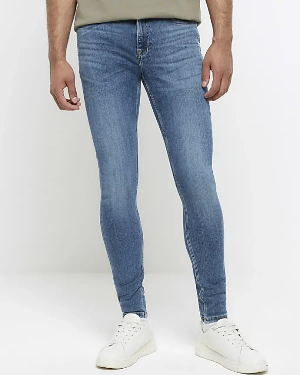 Blue super skinny spray on washed jeans