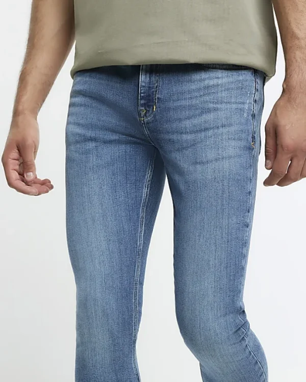 Blue super skinny spray on washed jeans