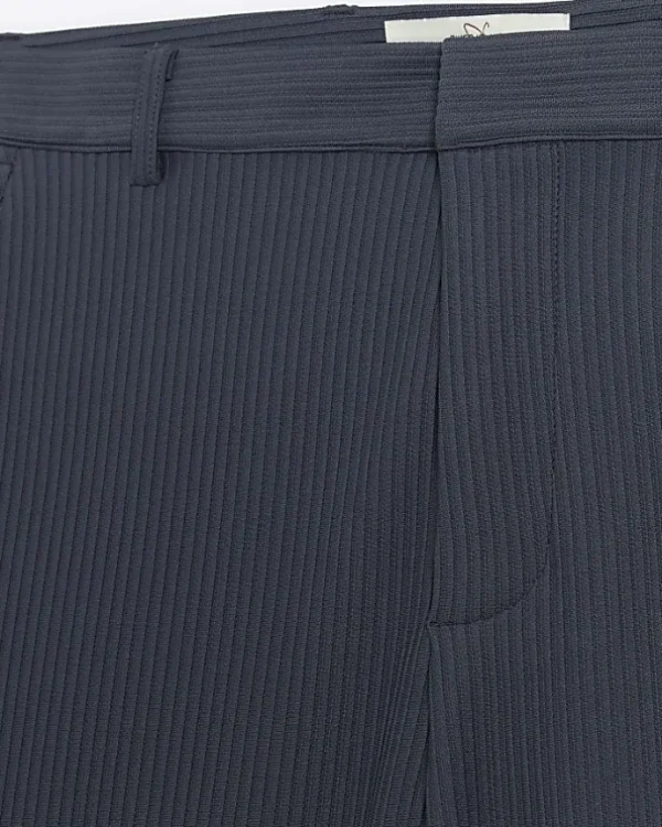 Blue tapered fit plisse smart trousers