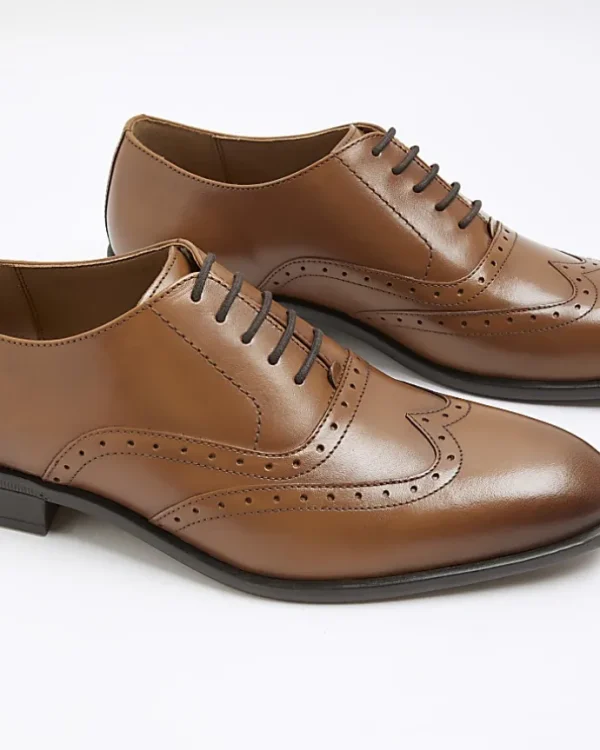 Brown brogue derby shoes