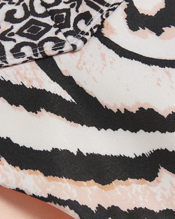 Cream abstract brief bikini bottoms