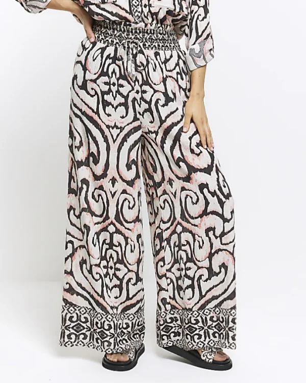 Cream abstract wide leg beach trousers