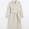 Cream belted longline trench coat