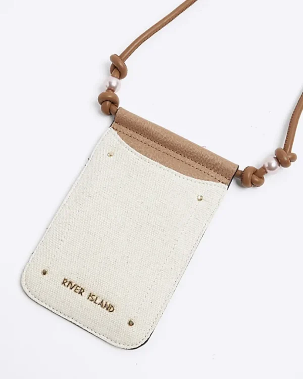 Cream canvas phone cross body bag