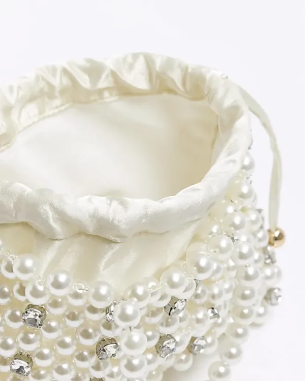 Cream pearl embellished handbag